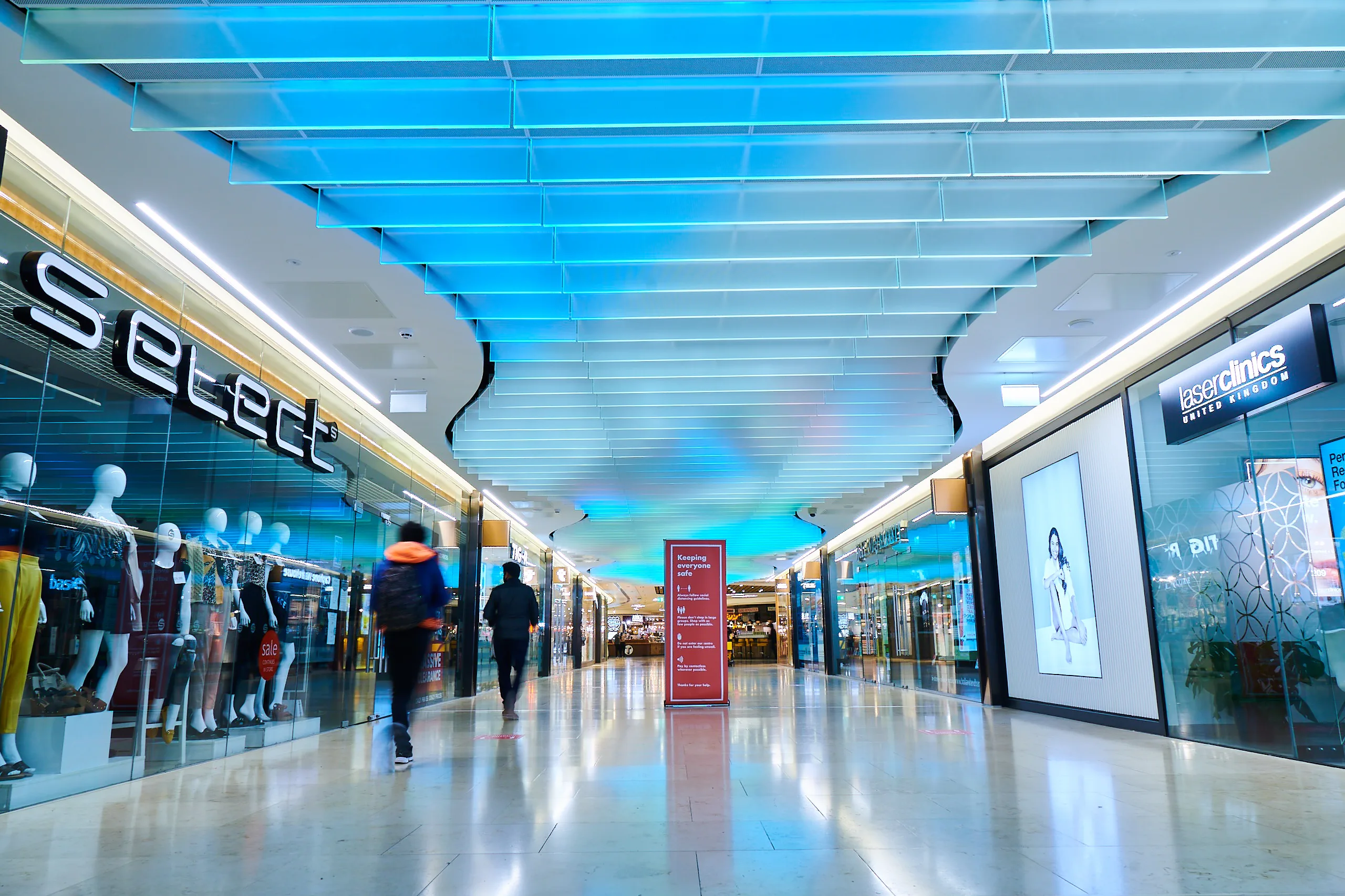 The Light Lab | retail lighting | bespoke spectraglass ceiling fins | edge llit glass | grand central birmingham