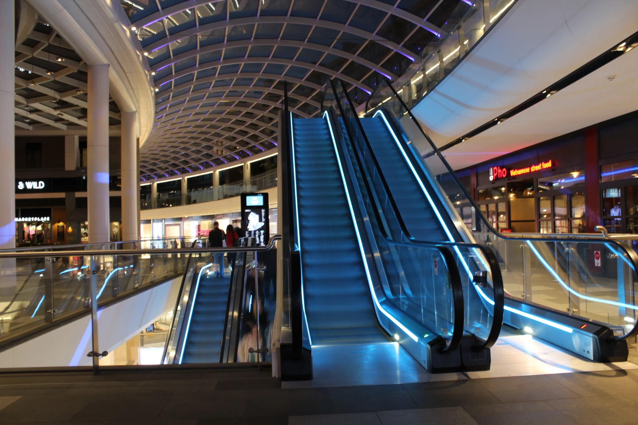 The Light Lab | St James Quarter | bespoke escalator lighting - Glowline | Custom retail lighting