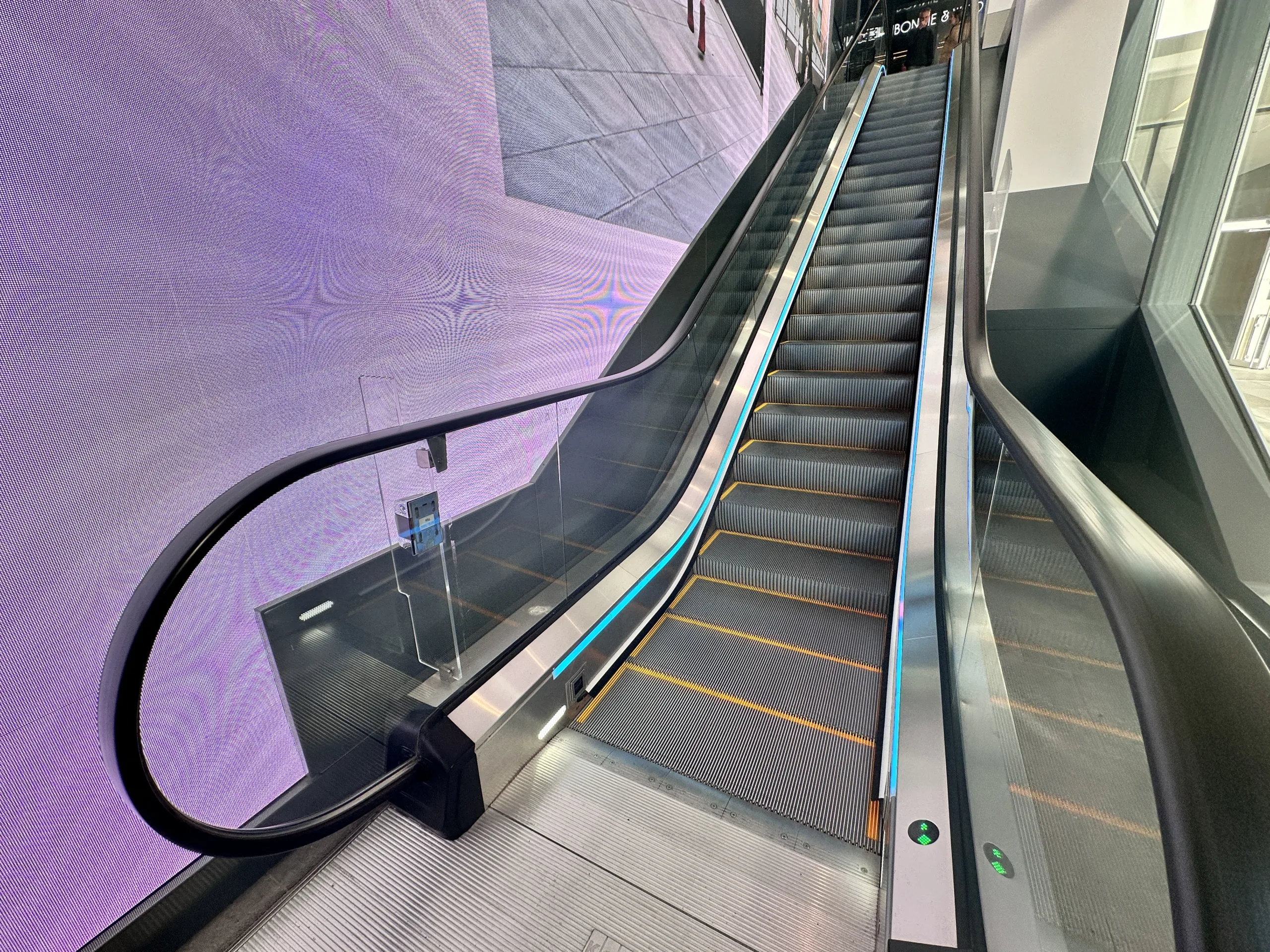 St James Quarter Edinburgh | Bespoke hospitality lighting | Customer retail - LED SPI escalator lighting | The Light Lab