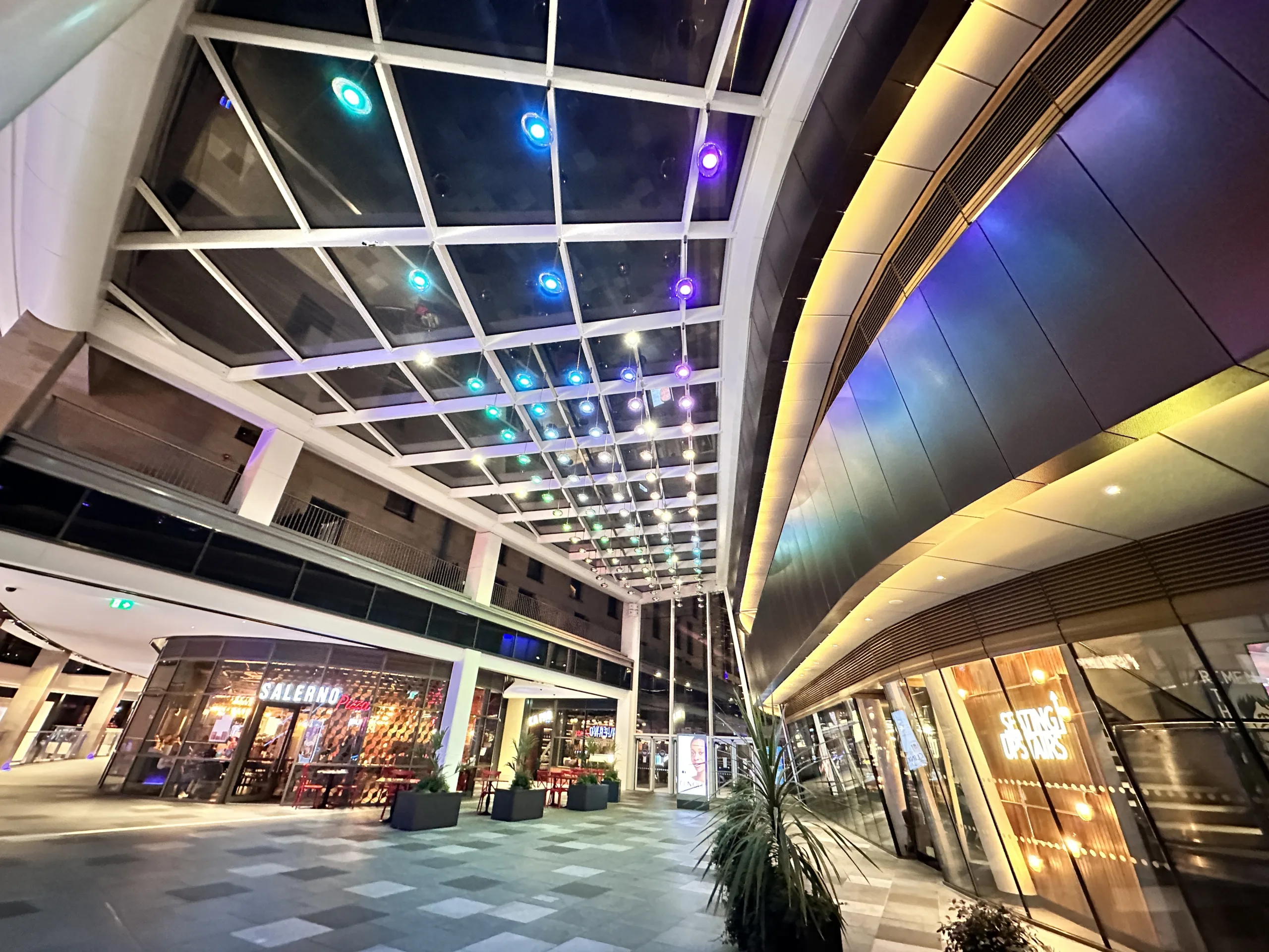 St James Quarter, Edinburgh | Bespoke retail lighting | custom illuminated ceiling pendants | The Light Lab