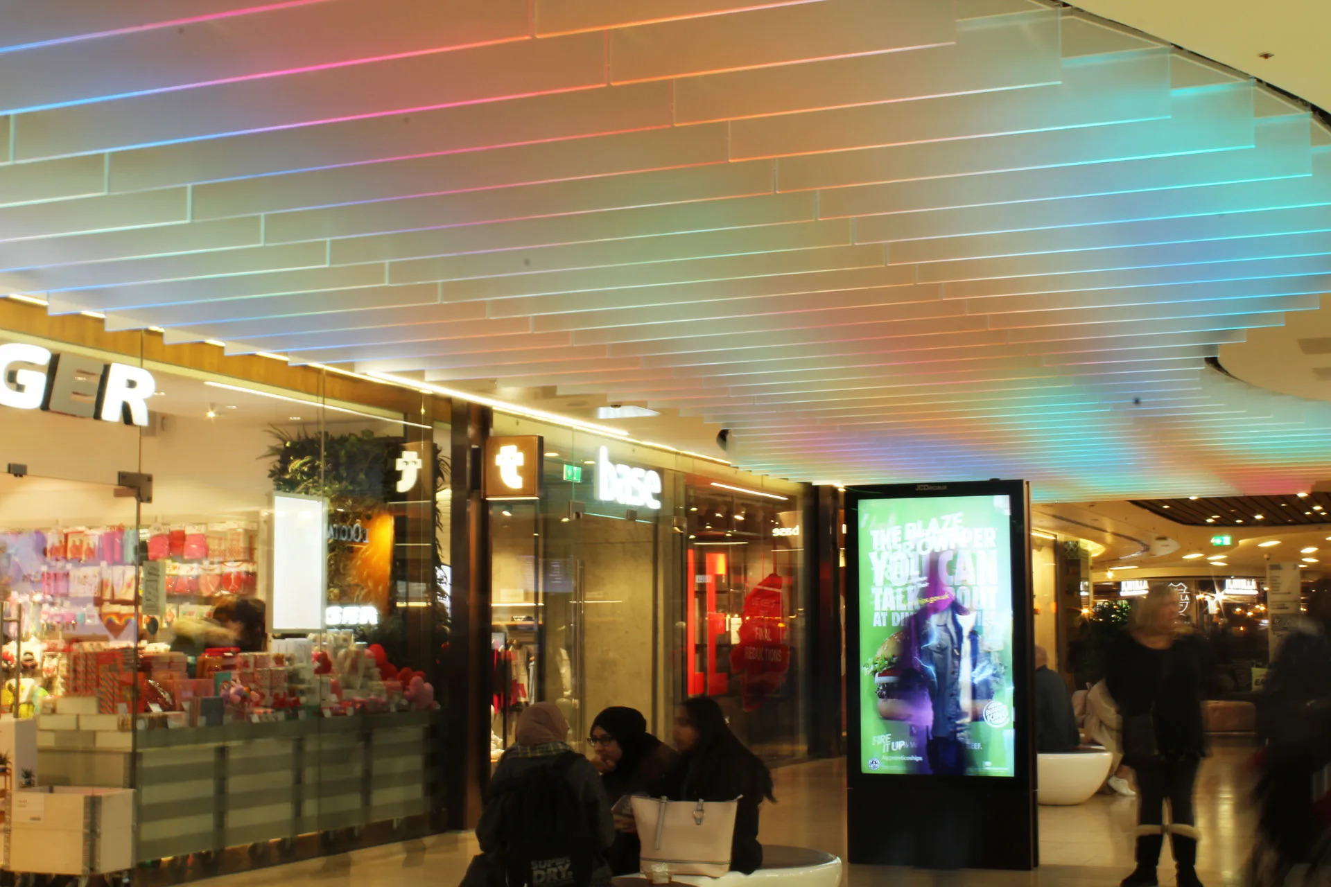 The Light Lab | retail lighting | bespoke spectraglass ceiling fins | edge llit glass | grand central birmingham